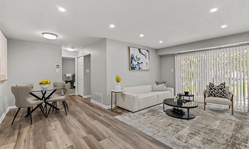 living room with couch table and chairs